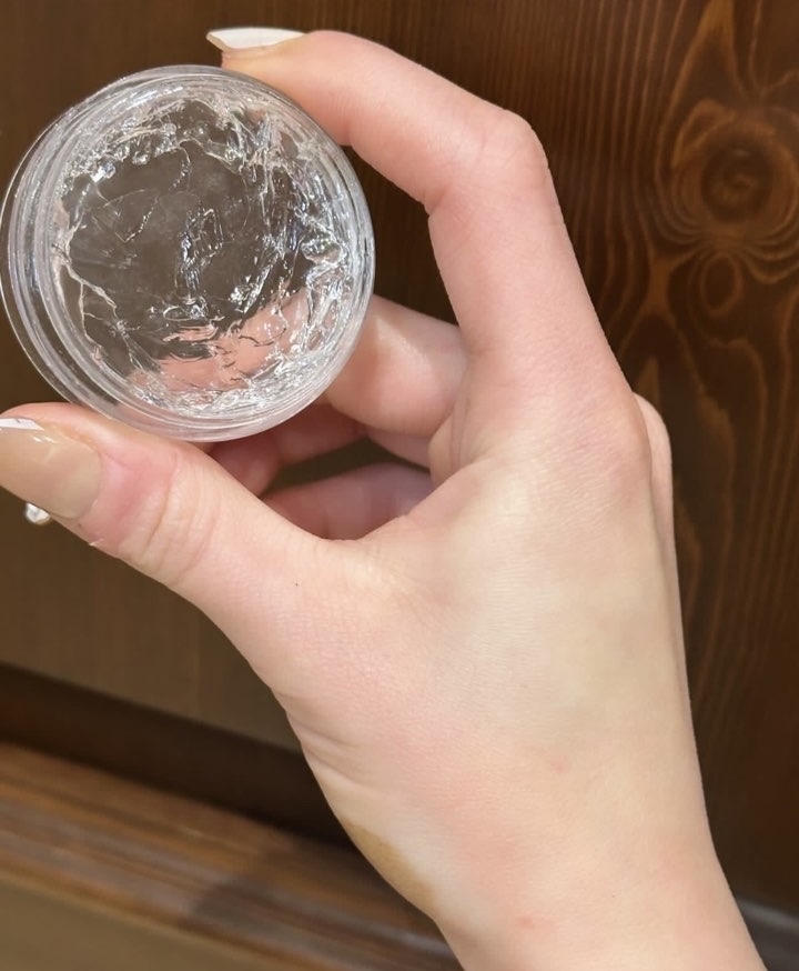 Clear eyebrow gel texture in an open jar